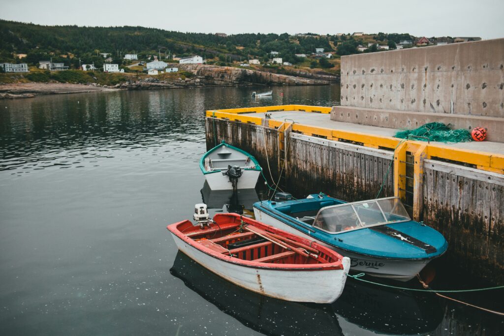 Boats tied to a dock.